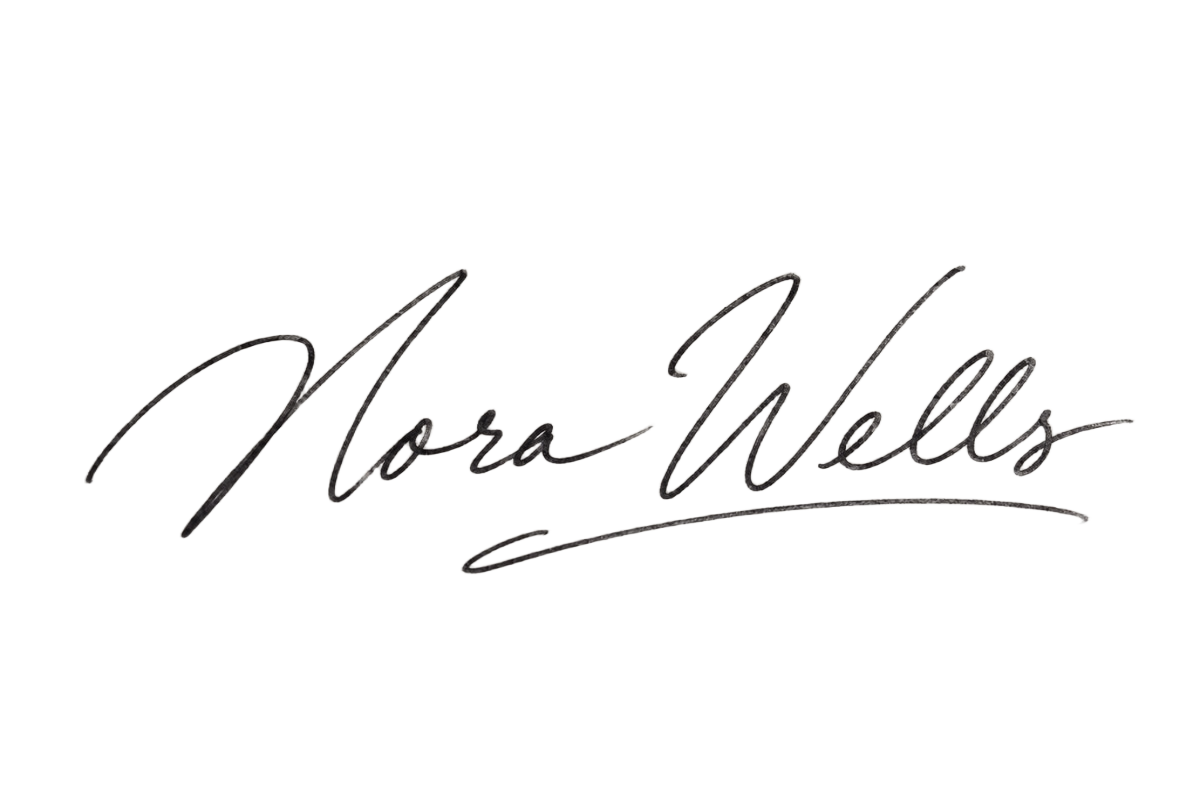 Firma de demostración de Nora Wells tras eliminar el fondo